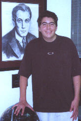 Craig Clawitter next to a picture of World Champion Jose Capablanca